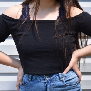 Cute cropped black offthe-shoulder tee from Ardene